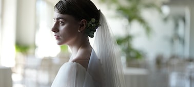 Example image showing a woman in a wedding dress facing right